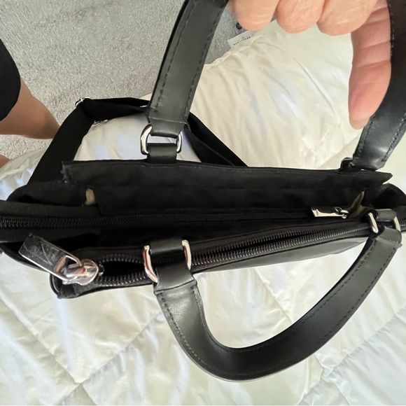 TUMI Kaylin Crossbody Nylon with leather fabric strap and leather strap. - Picture 6 of 9